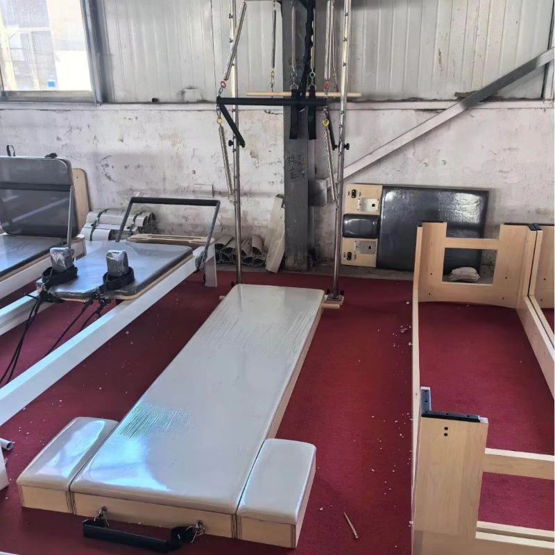 سرير تدريب بيلاتس خشبي قابل لل - مراجعة Pilates Yoga Reformer وسعره