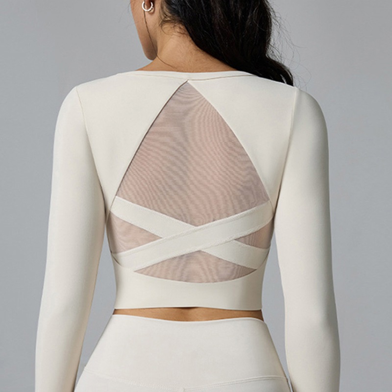 قميص يوجا أبيض بأكمام طويلة من - مراجعة Pilates Yoga Wrap Top وسعره